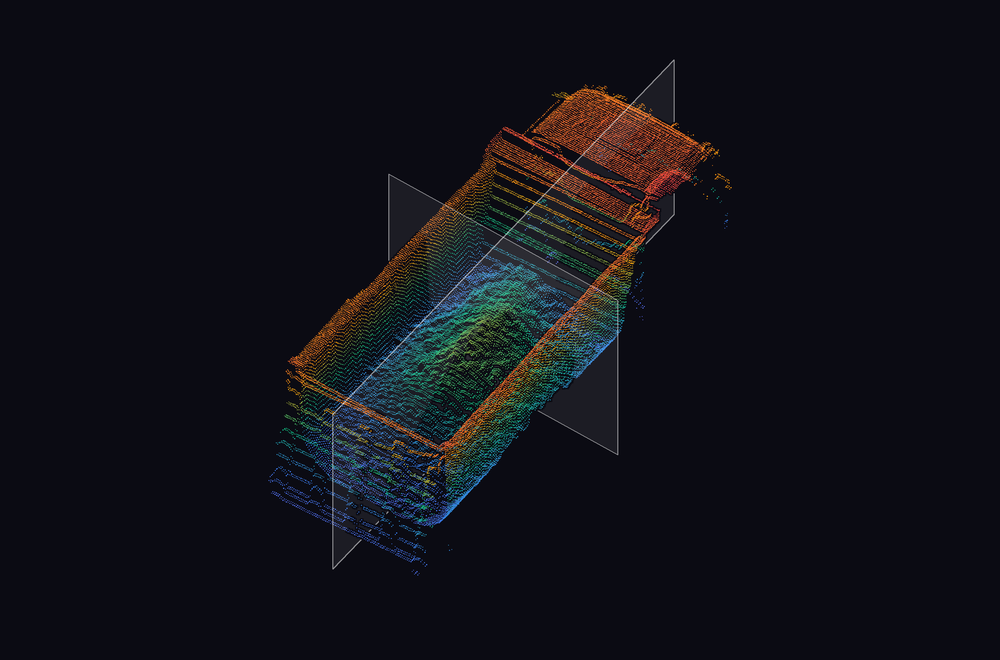 Leitura 3D colorida em perspectiva com dois planos transparentes que atravessam o veículo, com as partes posteriores ocultas pelo caminhão.